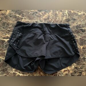 Black polka dotted Lululemon shorts.